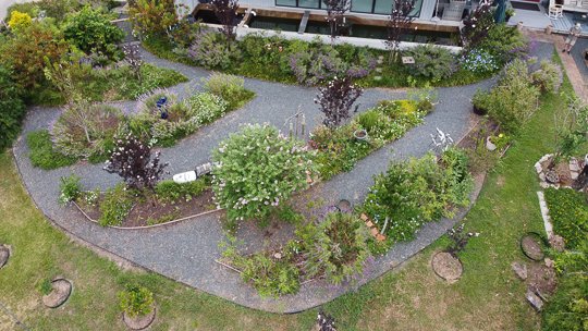 The garden promotes cooling airflows and calming views