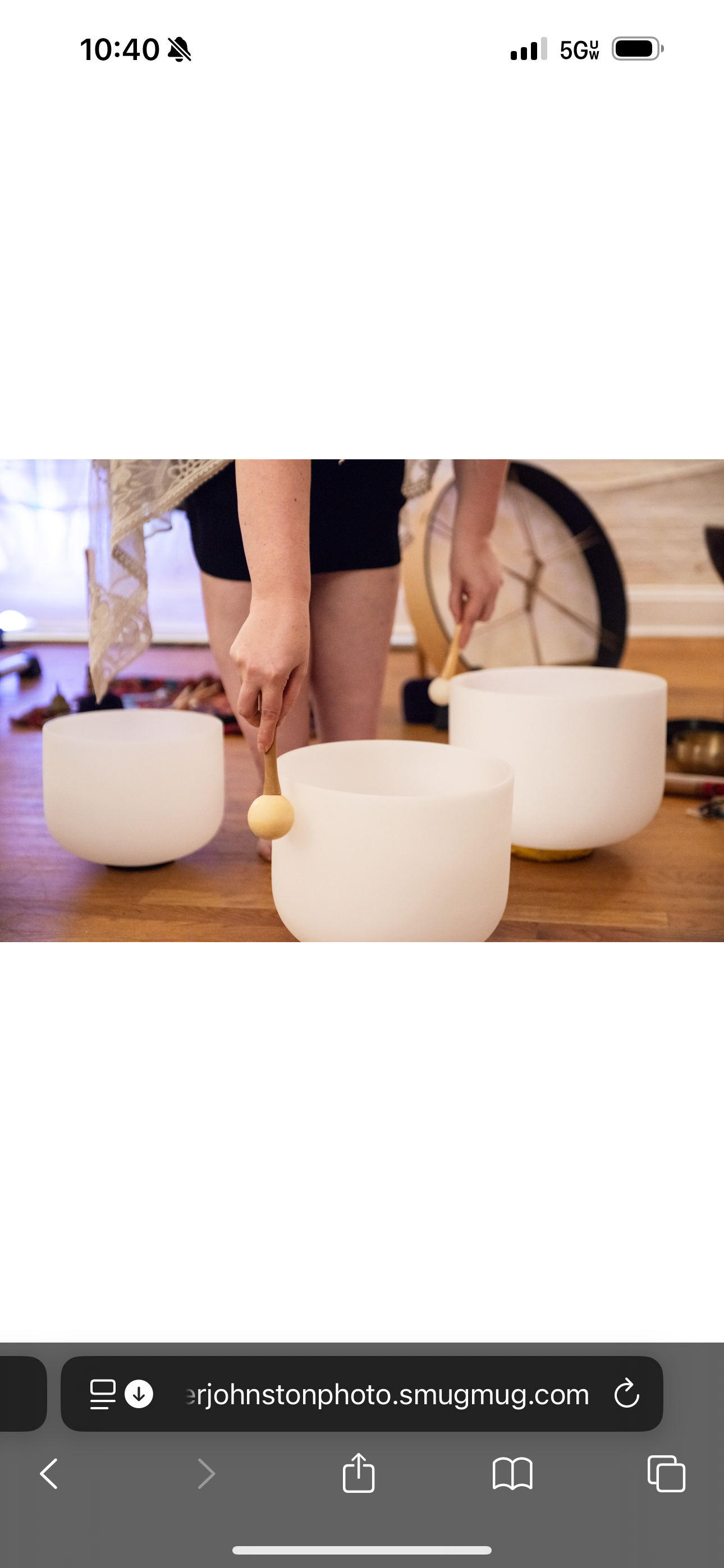 Alexandra stands over crystal bowls to illustrate playing multiple bowls