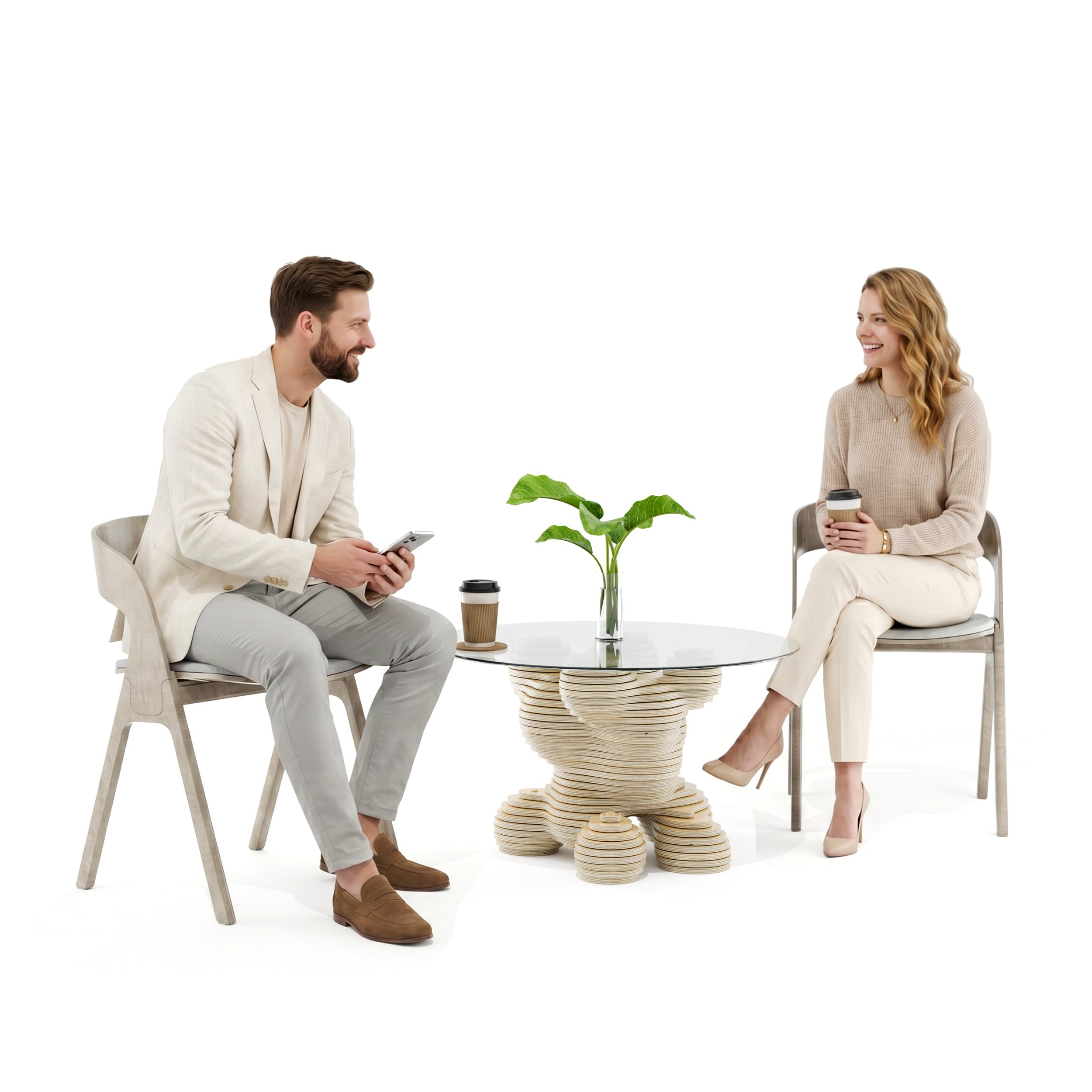 Two people, a man and a woman, sitting across from each other at a low profile coffee table in a unique 'parametric' wooden shape with a green plant in a glass vase and two disposable coffee cups.
