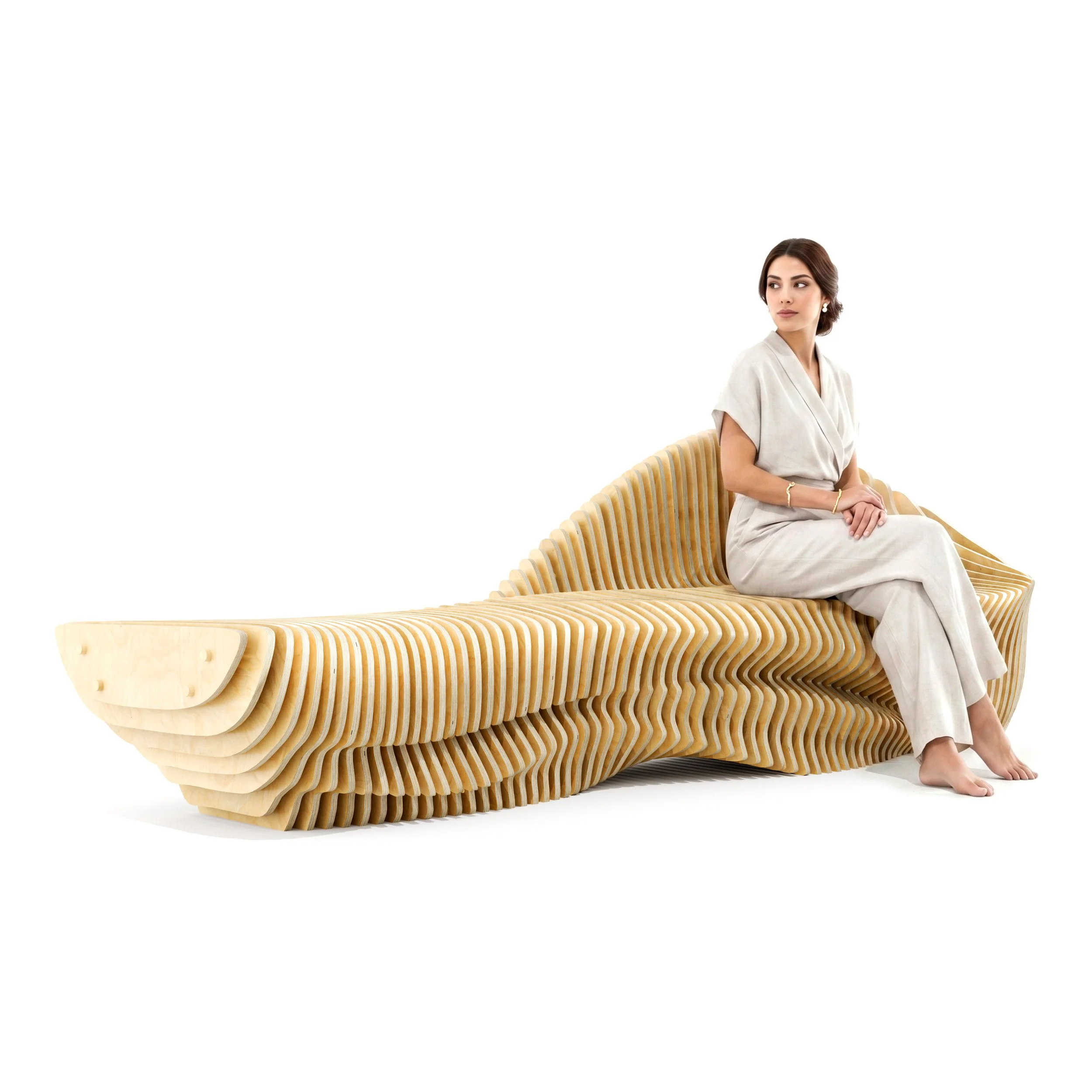 A woman with brown hair sitting on a modern parametric and sculptural wooden lobby bench with a wave design, wearing a light beige dress and earrings, looking to her right against a white background.