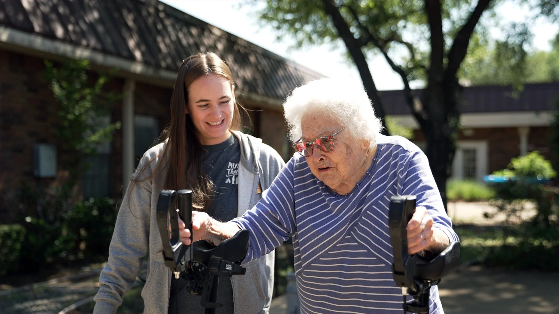 UPTIME Films captures an employee helping a senior patient for Momentum Skilled Services marketing video
