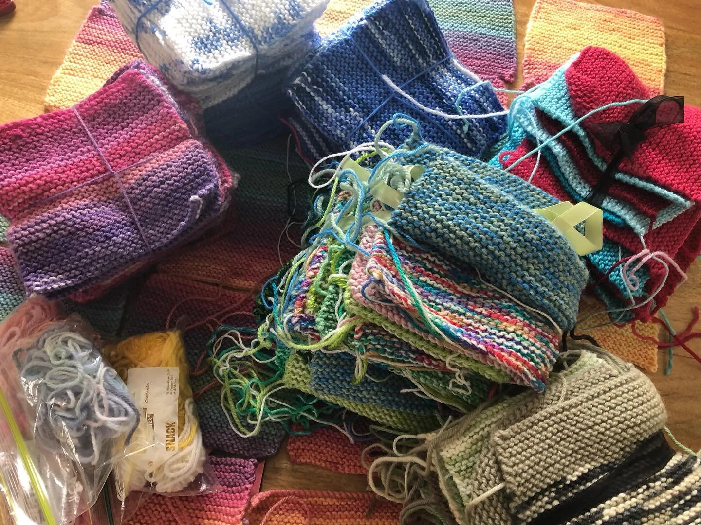 From many squares to 6 blankets bound for the NICU 🌈🧶🩷 Thanks Lynette, our long time sewing superstar!