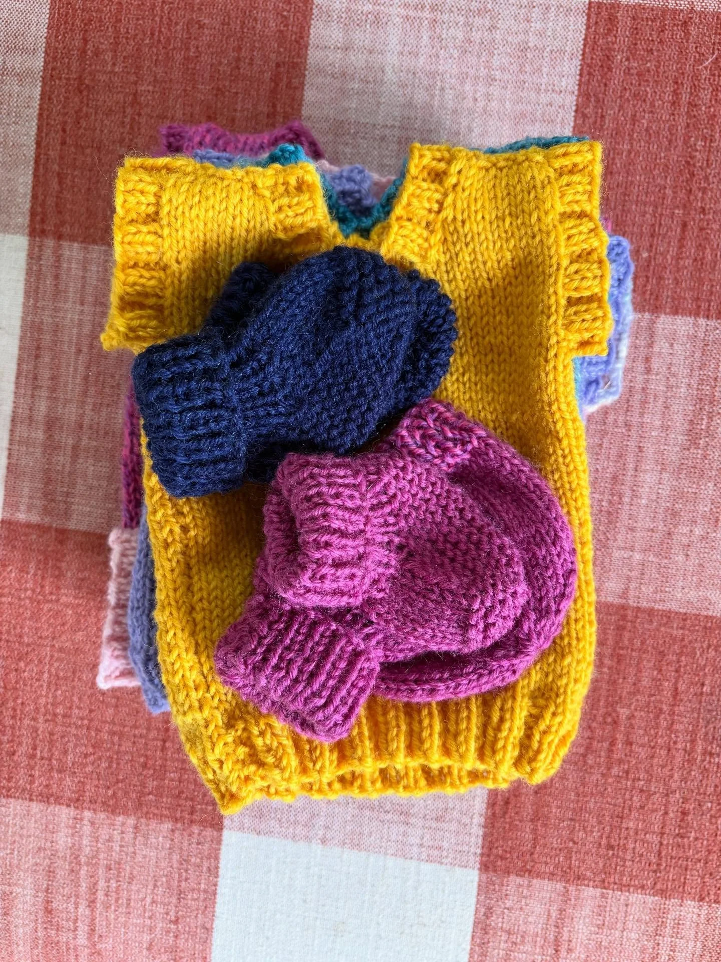 Thanks to our wonderful supporter, sewing superstar and knitter Lynette who has been the biggest help with our peggy square blankets for many years now. She&rsquo;s included these beautiful singlets along with a huge stack of sewn up blankets 🩵🥰 We