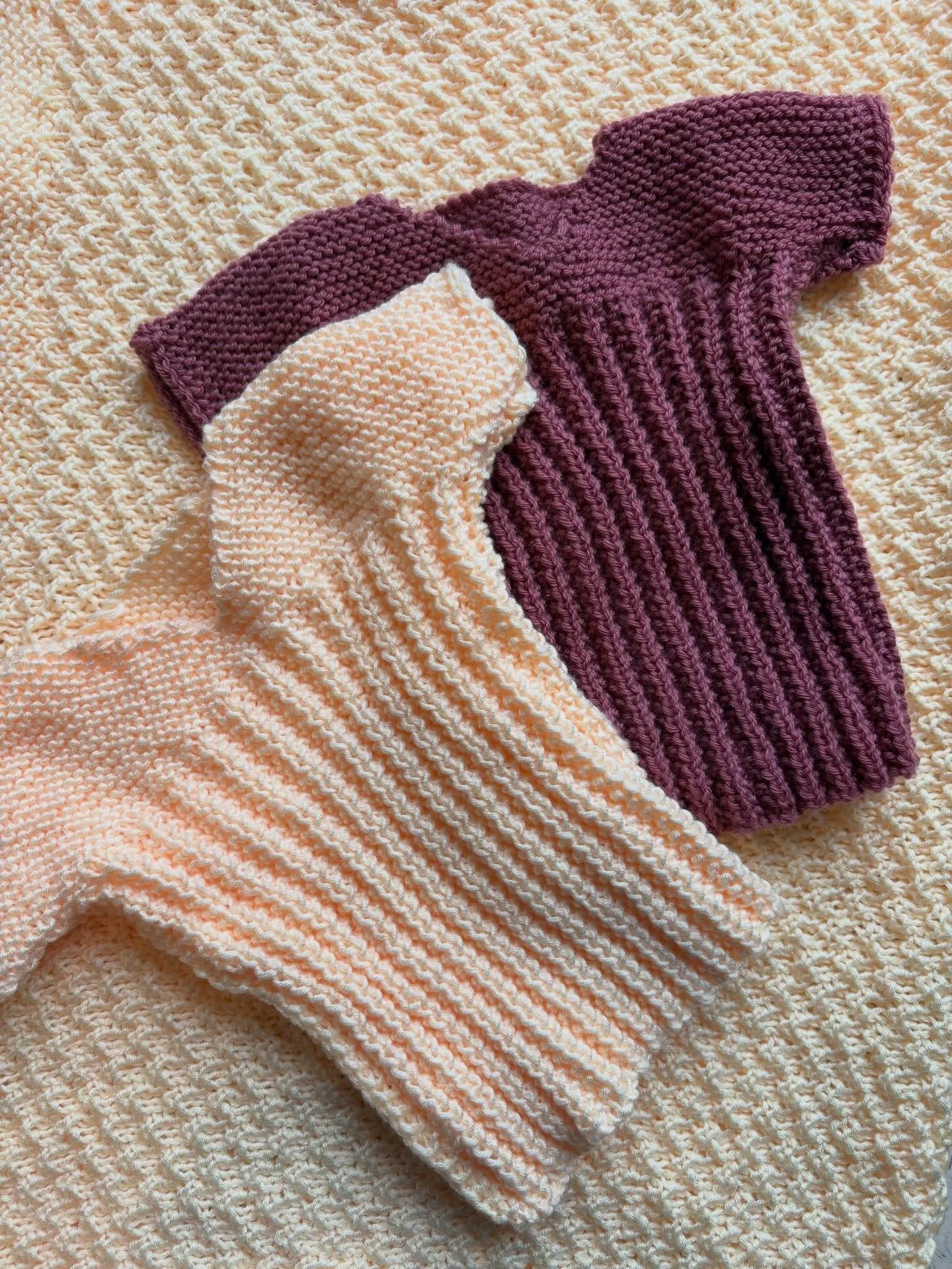 Singlets and blanket made by our wonderful regular knitter Janet 💛💗