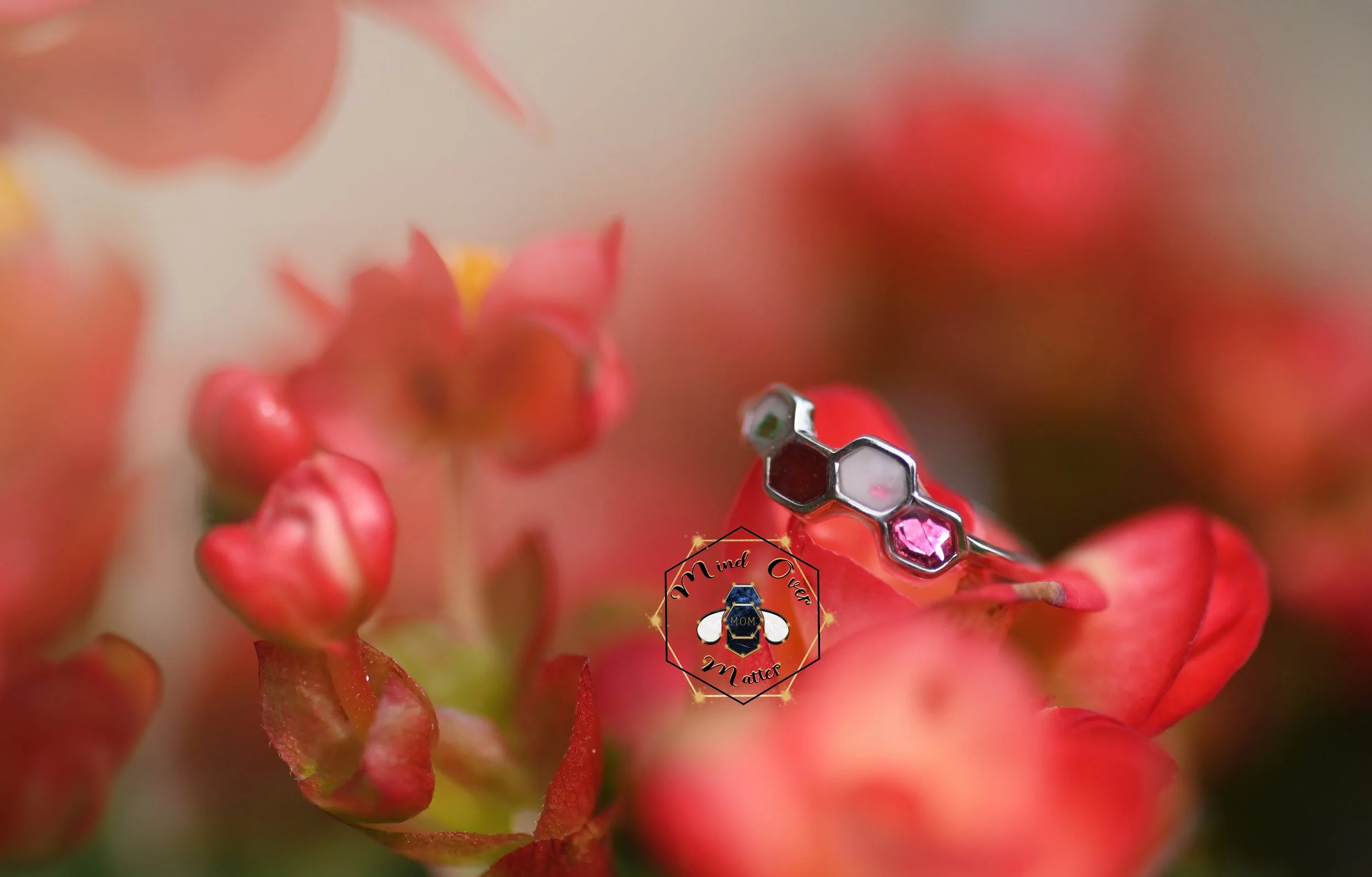 The Hive DNA keepsake ring with breastmilk, gestational sac, and birthstone flecks.