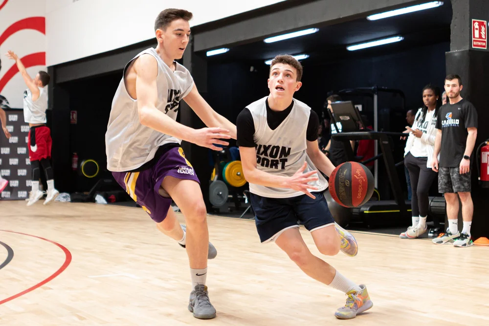 T-John Casiello training basketball players in Spain