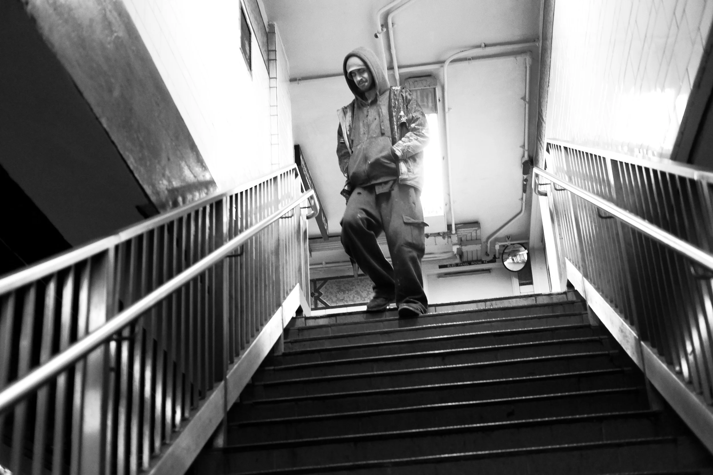Man Walking Down Stairs.jpg