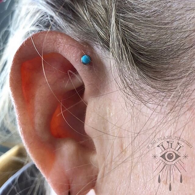 Some forward helix action! Who doesn&rsquo;t love turquoise? 🙌🏼
.
I will be here at @landlocked_tattoo_kc till 8pm today! I do still have some free spots available today. So feel free to give us a call 816-800-4528 to set up an appointment or you c