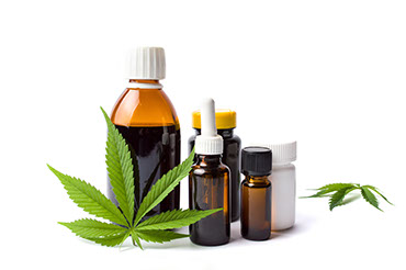 marijuana and cannabis oil bottles isolated.jpg