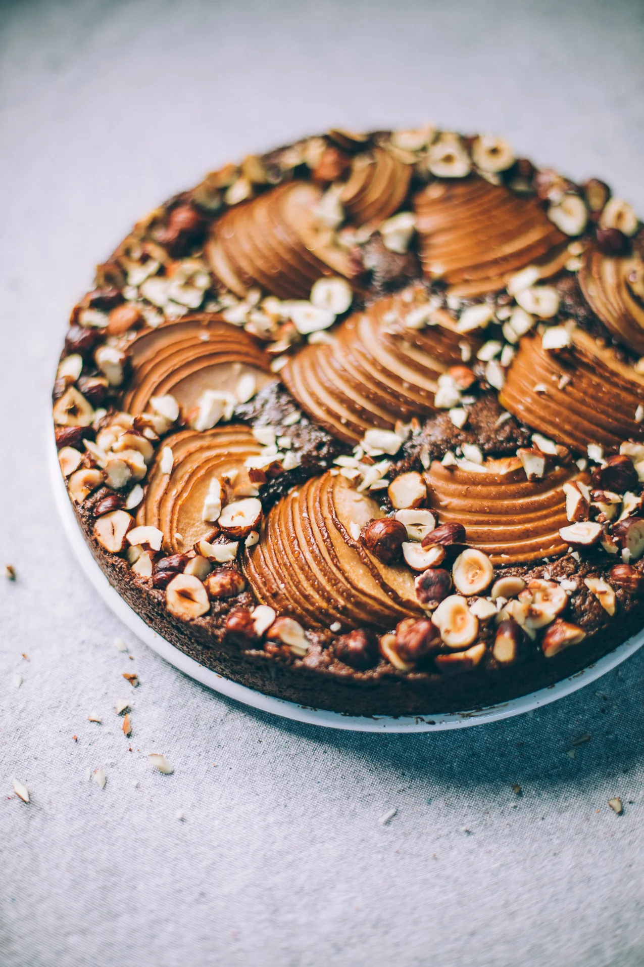 Flourless Chocolate Olive Oil Cake with Cardamom, Pears and Hazelnuts