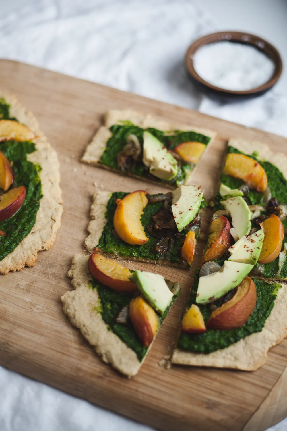 Peach, Avocado, & Caramelized Onion Flatbread w/ Kale Pesto & Sumac (Vegan)