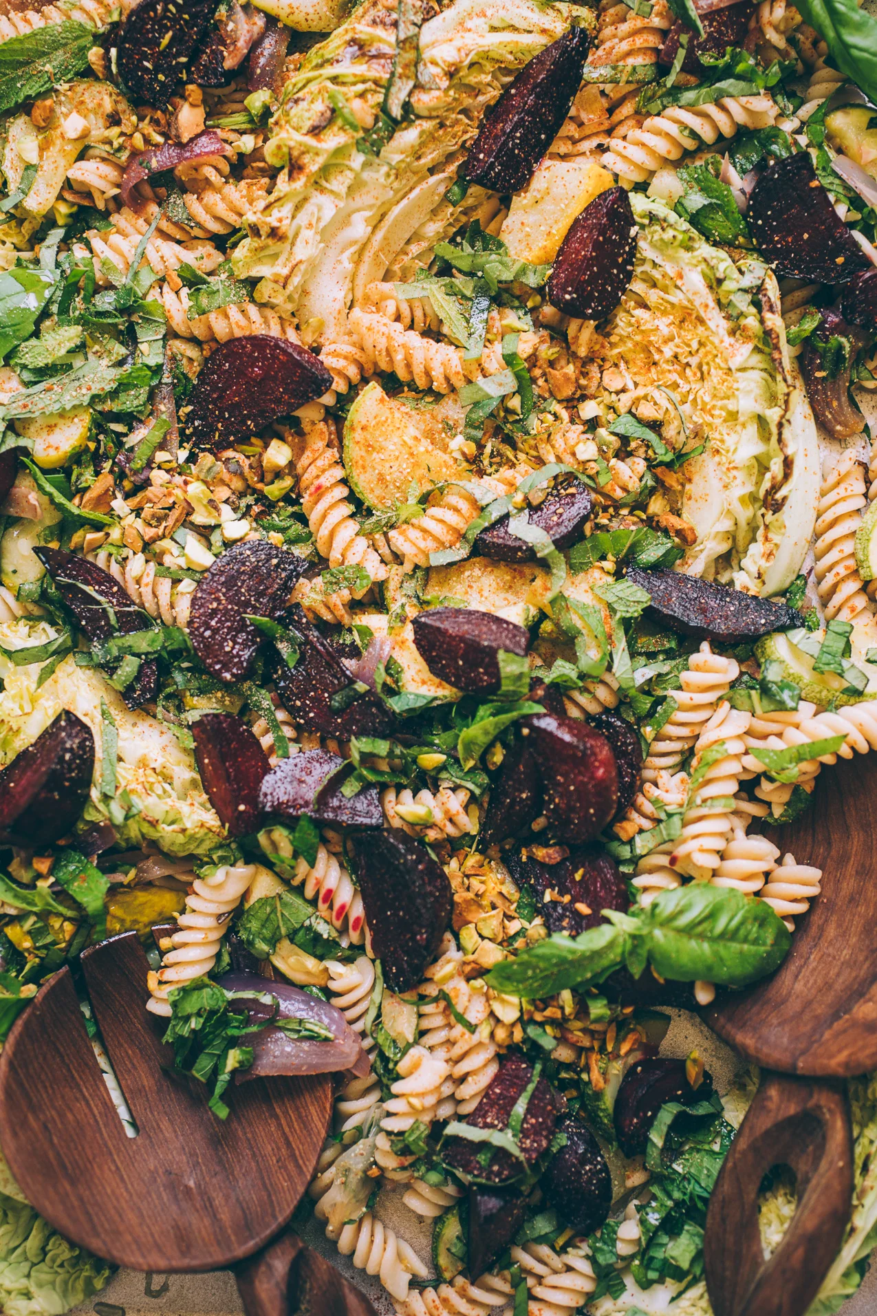 roasted farmers market pasta salad with basil, mint and pistachios