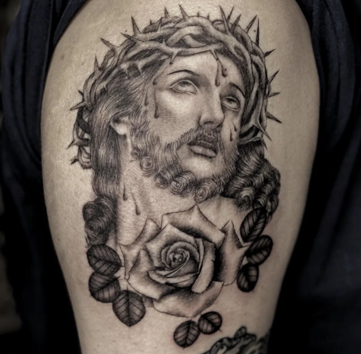 Fine line portrait tattoo with detailed shading and realism elements