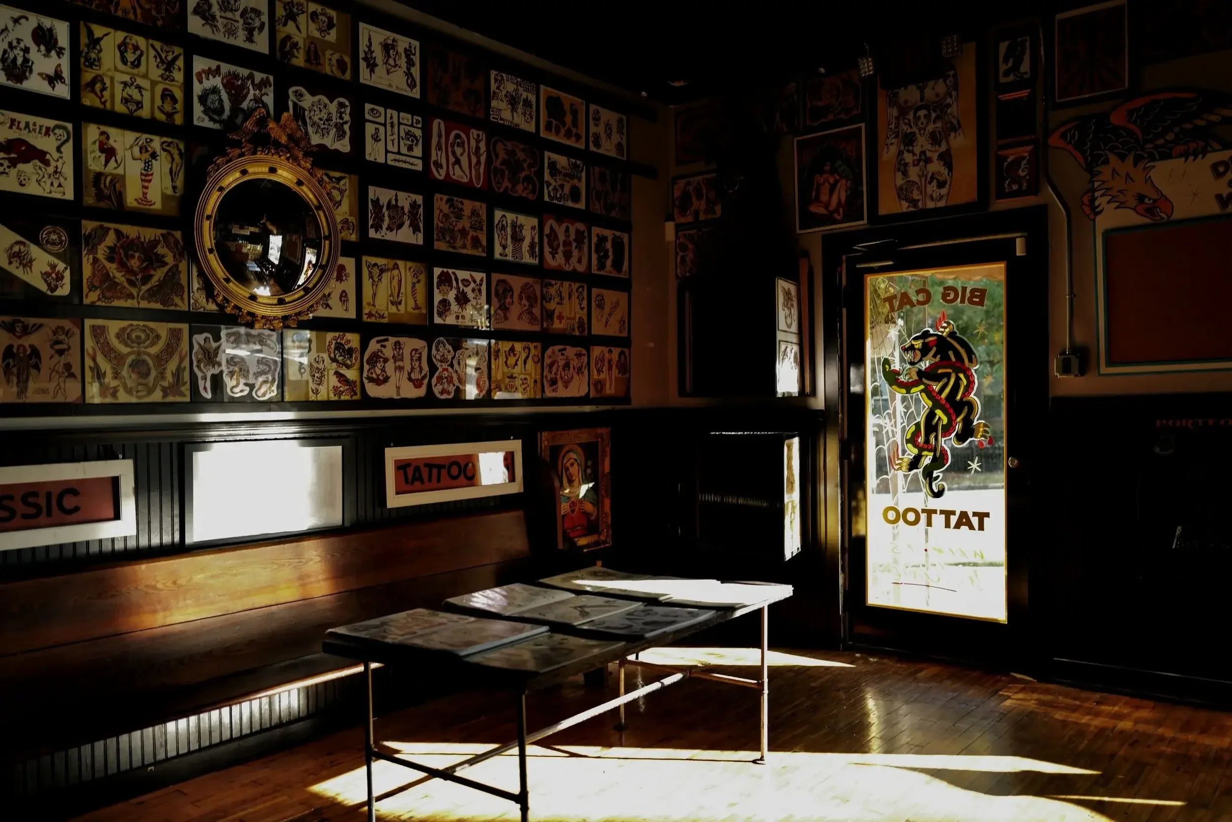 Big_Cat_Tattoo-Inside-Tattoo-Shop.webp