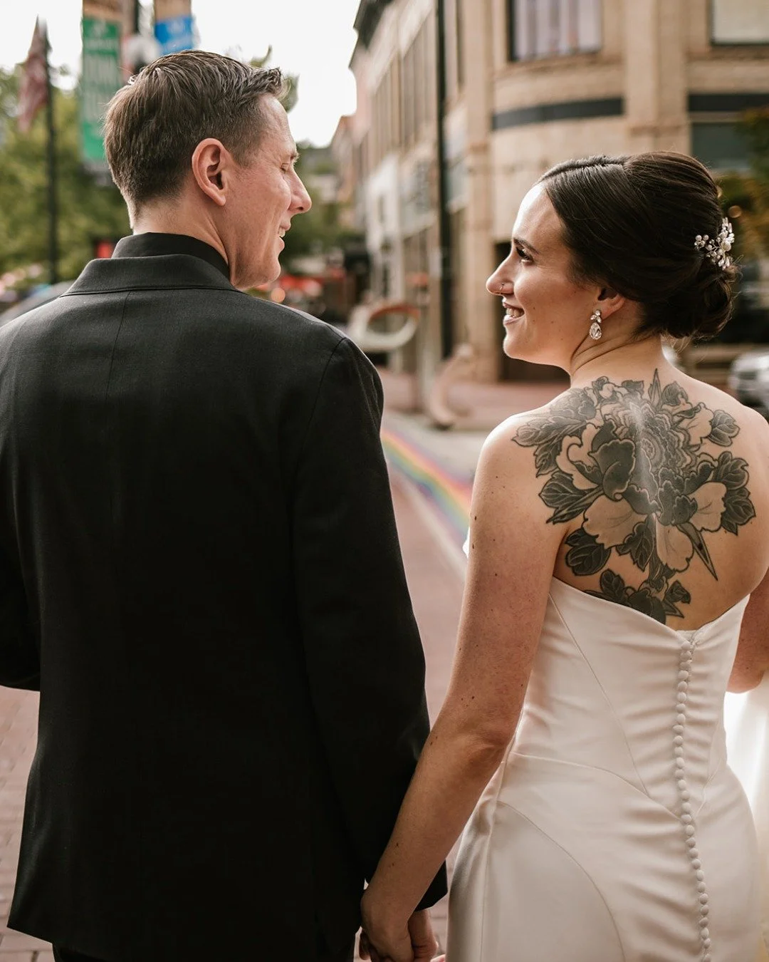 Modern beauty with a twist, literally. We created a romantic low bun and soft glam makeup to reflect our bride&rsquo;s one-of-a-kind style. Hand in hand into forever never looked so good. 🤍

Photographer: @riseimagesart
Venue: @hotel.boulderado @bou