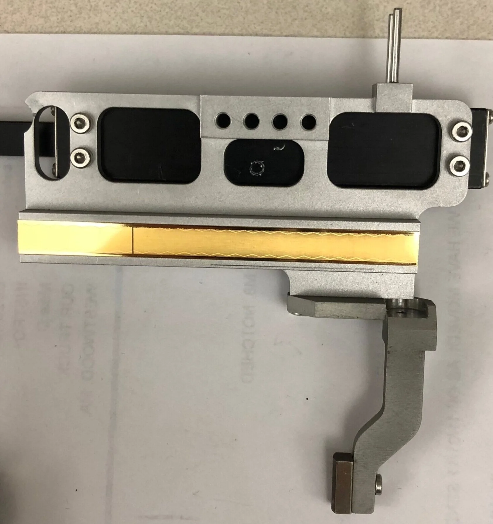 Pictured above is the previous iteration for the bottom portion of the extensometer that contained the scale.