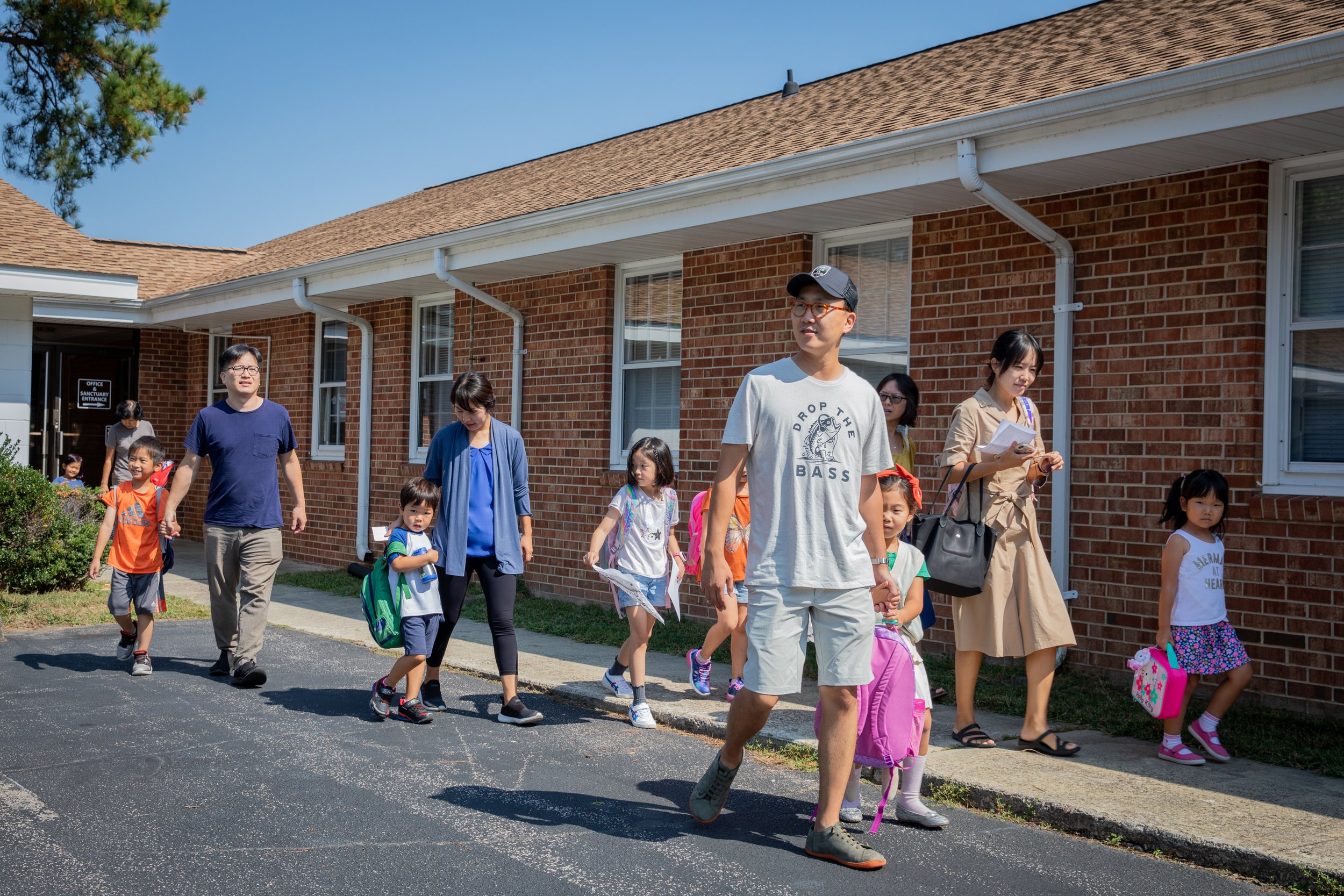  Parents come back to the church to pick up their kids after school. There is a mixture of parents who are Korean, Korean American, and other races. 