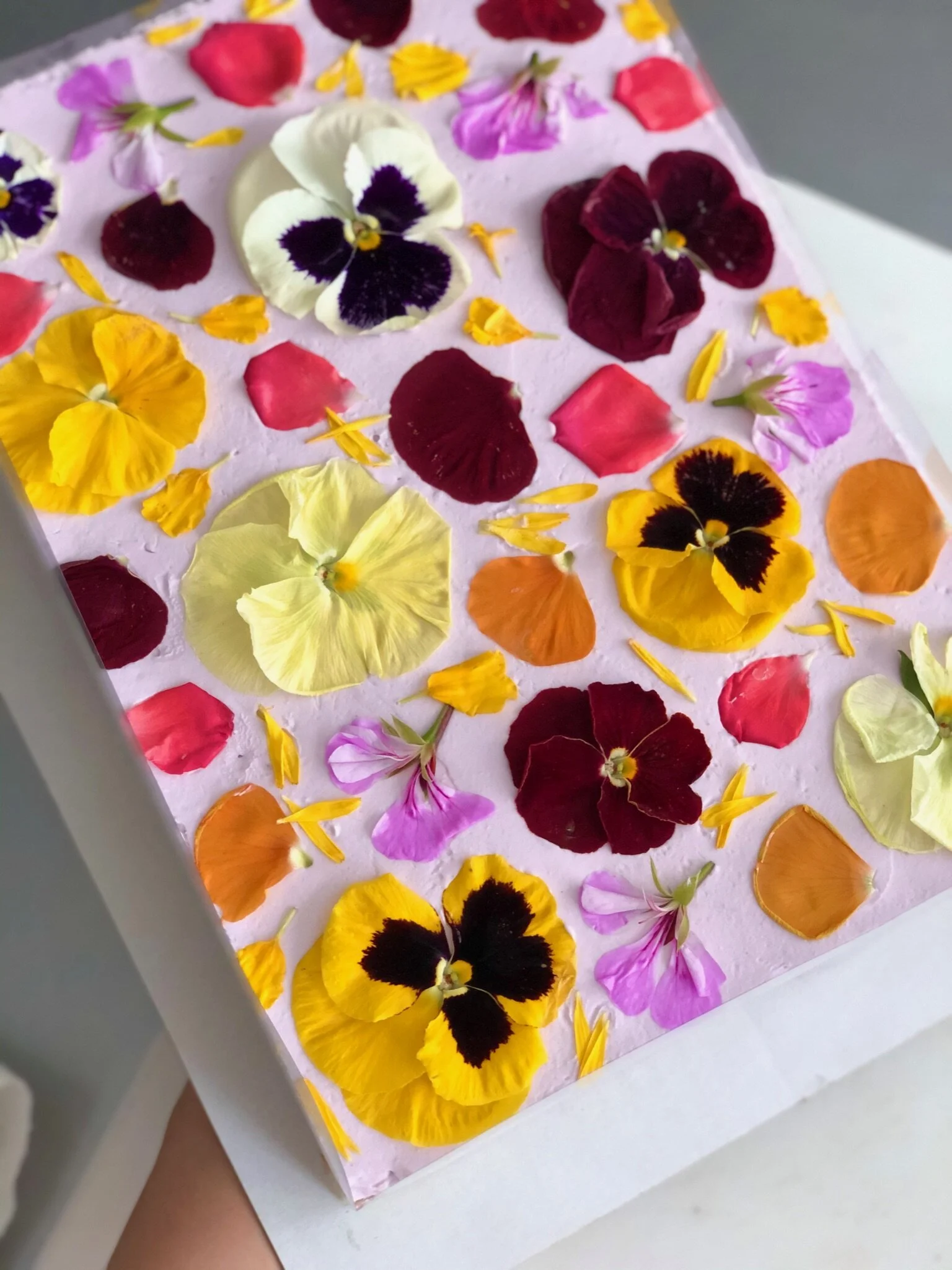 Our sheet cake which is 2 layers of cake with complementary buttercream, in our signature styles.