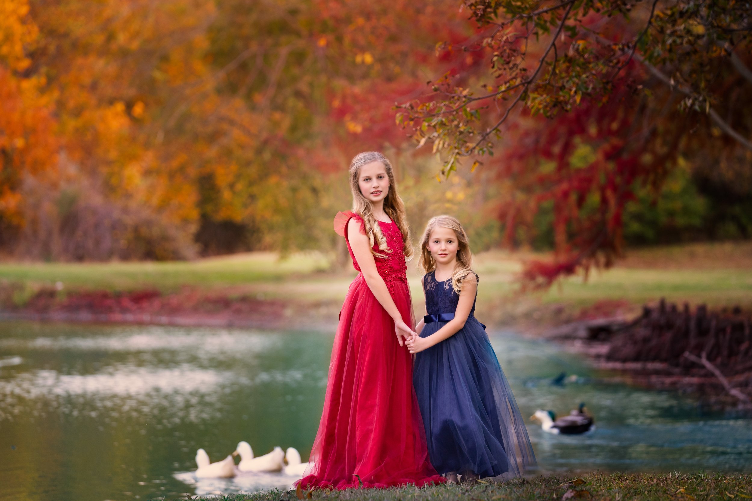 Elegant Dallas child photographer portraits in front of pond in Dallas Texas