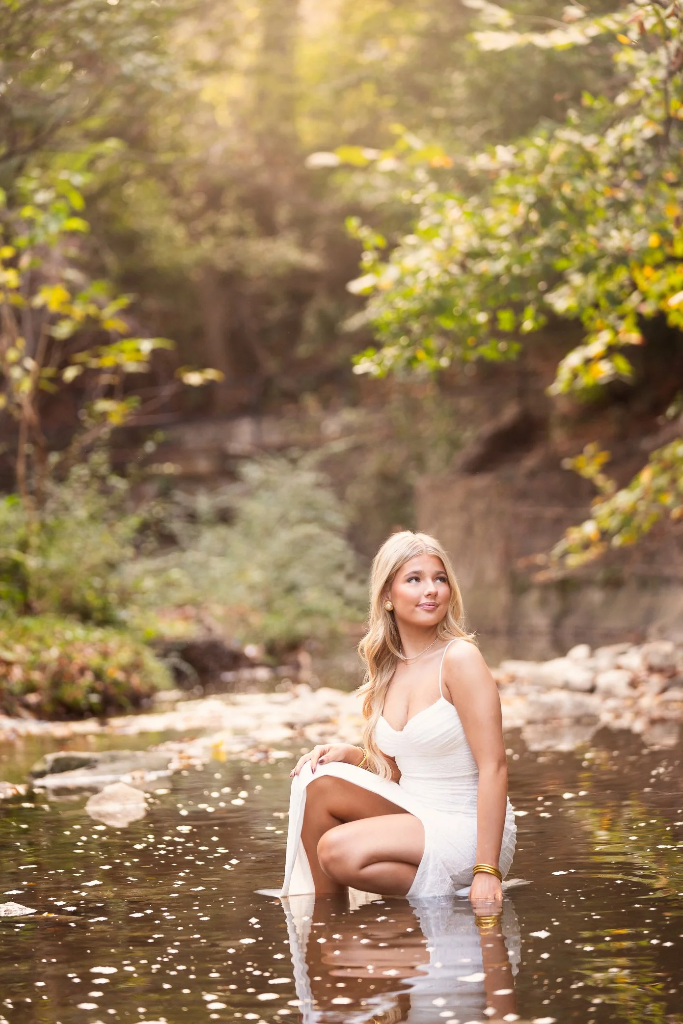 Dallas Senior Photographer Outdoors in Creek Highland Park
