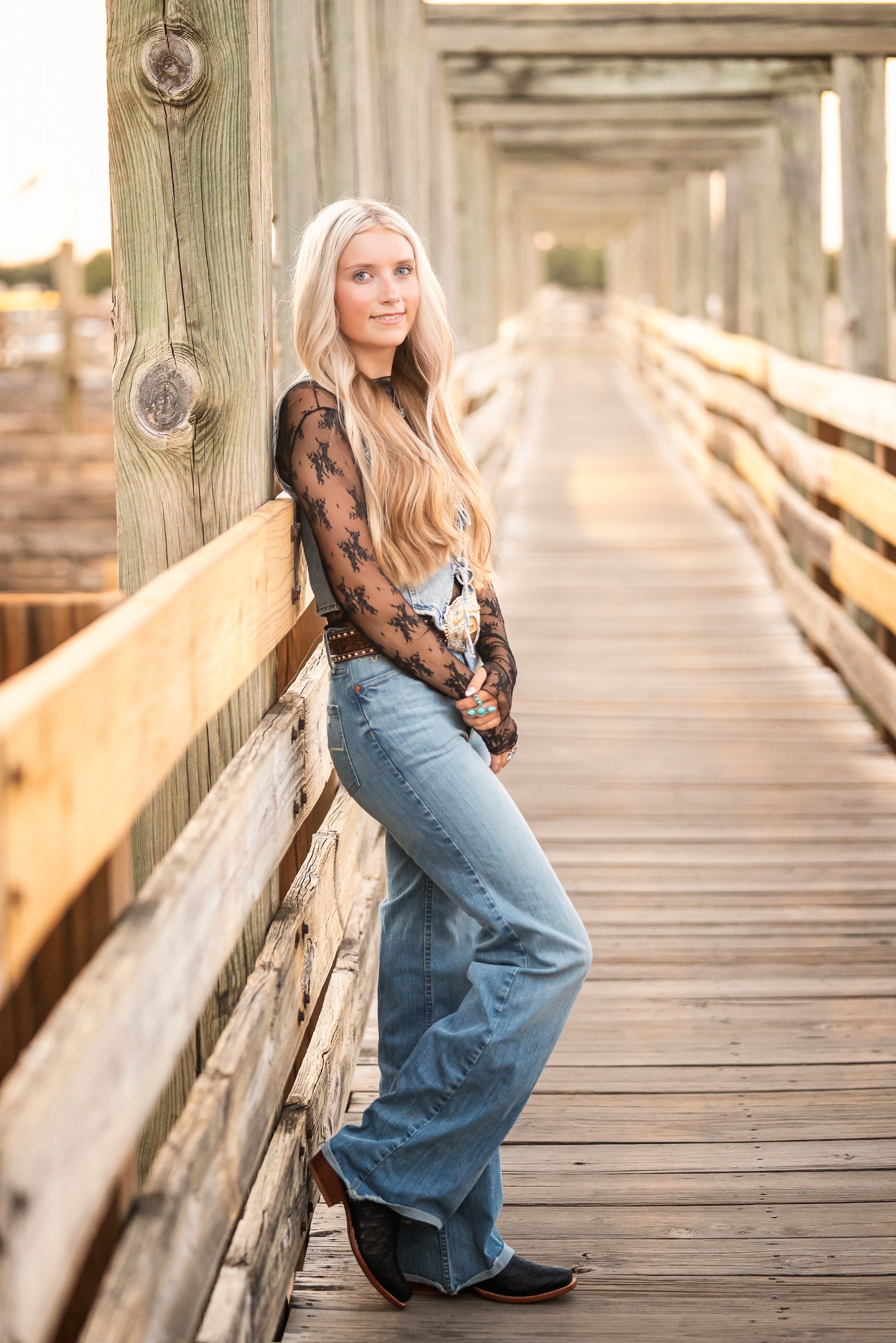 Fort Worth Stockyards senior session on cattle bridge