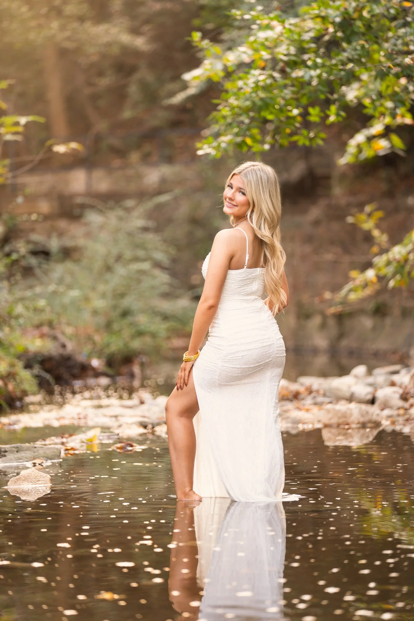 Dallas senior portraits outdoors by creek