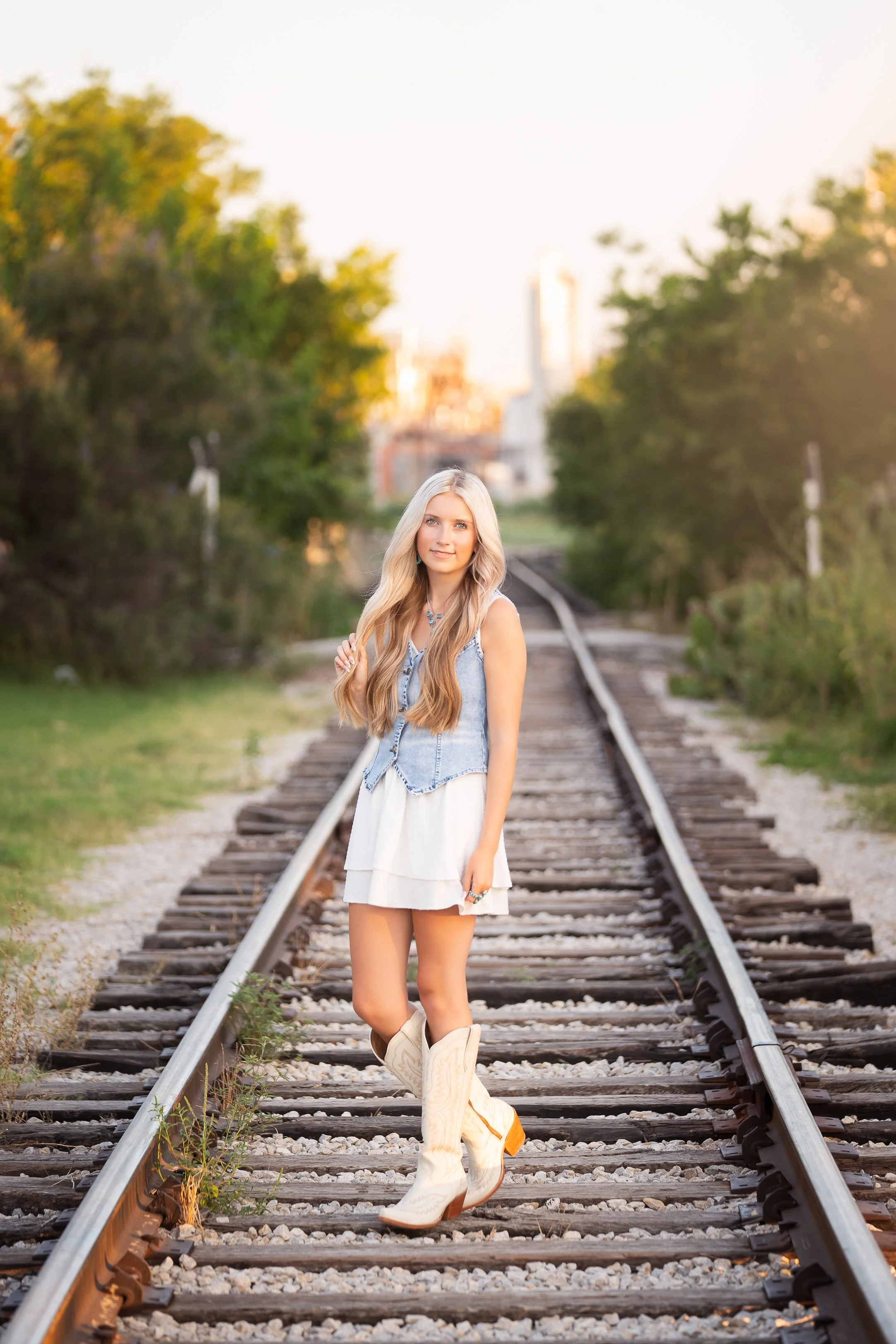 Fort Worth Stockyards senior pictures on railroad tracks