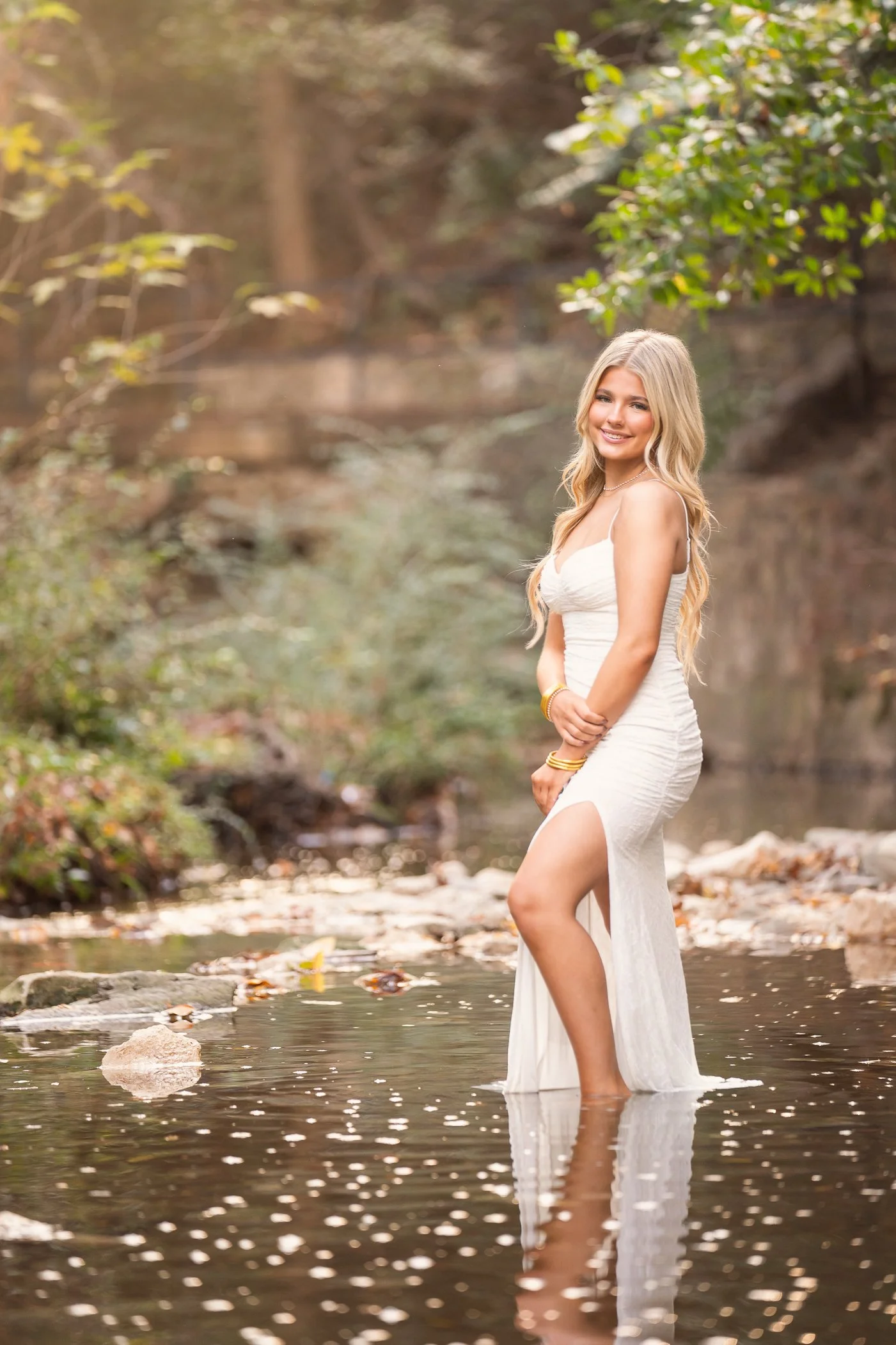 Dallas senior portraits outdoors by creek