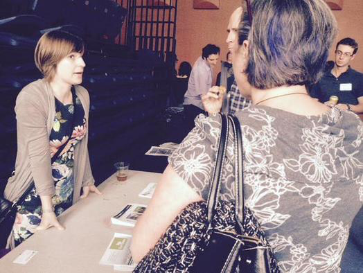Leah Missik - The new Director of Built Green talks to happy hour guests about the Built Green program.