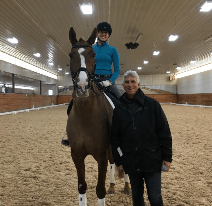 Madelyn Taray riding Elzarma with George Williams
