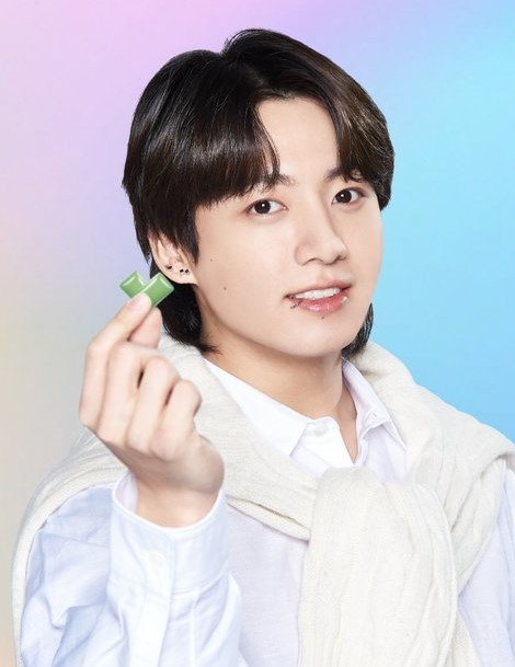 Jungkook poses holding with BTS Xylitol gum