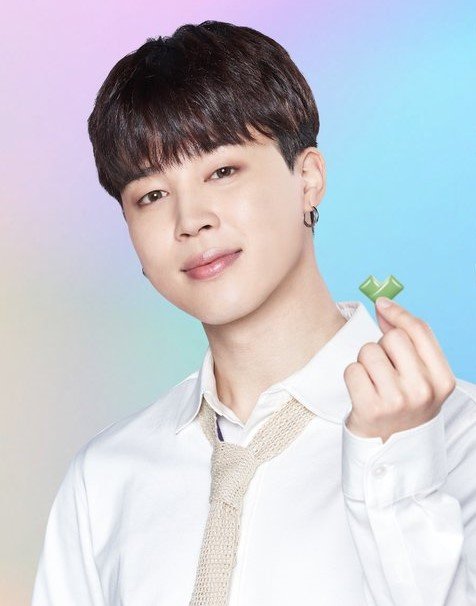 Jimin poses holding with BTS Xylitol gum