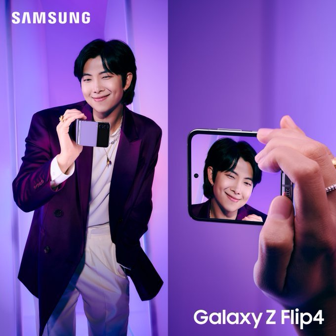 RM holds the new Galaxy Z Flip4 like a camcorder.