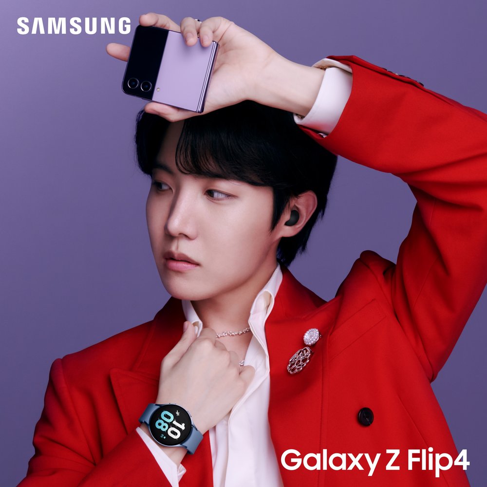 j-hope wearing the new Galaxy Watch 5 and Buds 2 Pro while holding the new Z Flip4