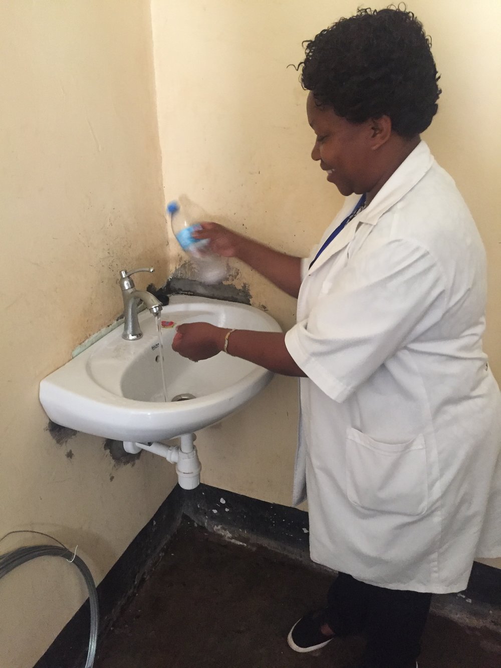 Dr. Lucy and the other health workers at the dispensary can safely wash their hands during and between patient visits. 
