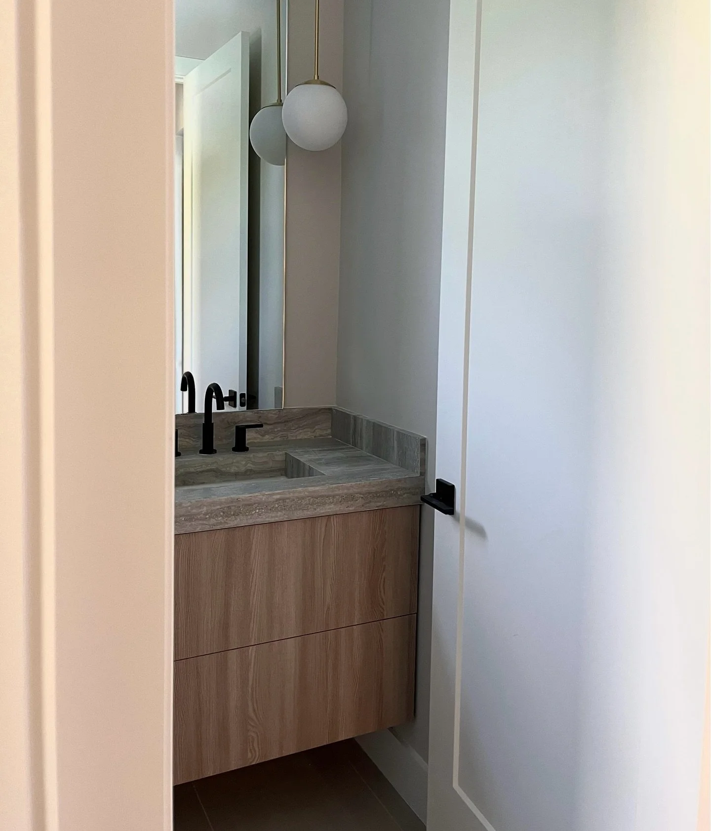 The art of thoughtful simplicity 💫. We loved designing this space for our clients who were looking for a clean, minimal approach