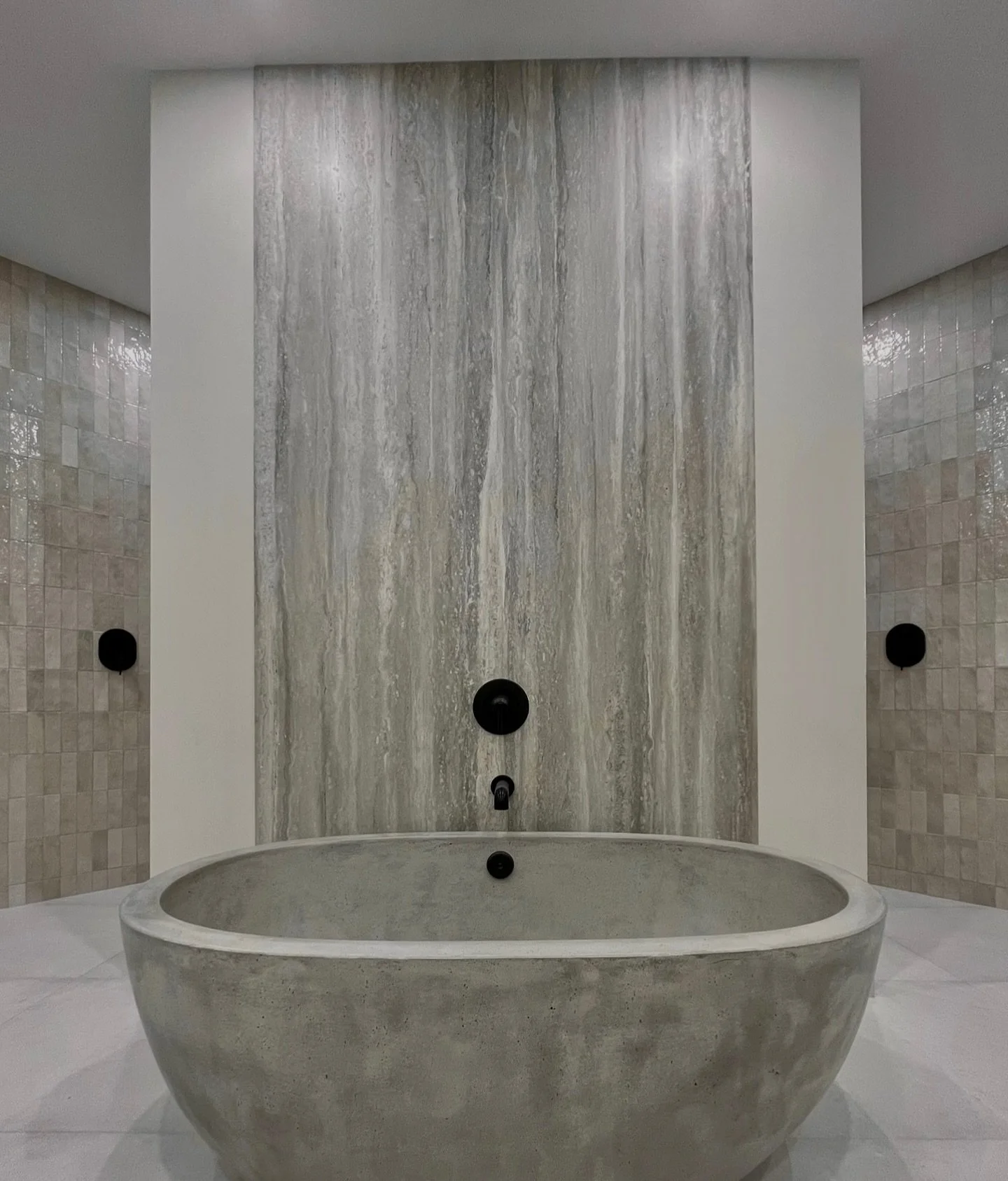 The bathroom you didn&rsquo;t know you needed to see today. From our Florida build project; tonal defined by texture. Start off the weekend here, shall we 🕯️ 

#InteriorDesign #Bath #Bathroom #Build #Stone #Tile