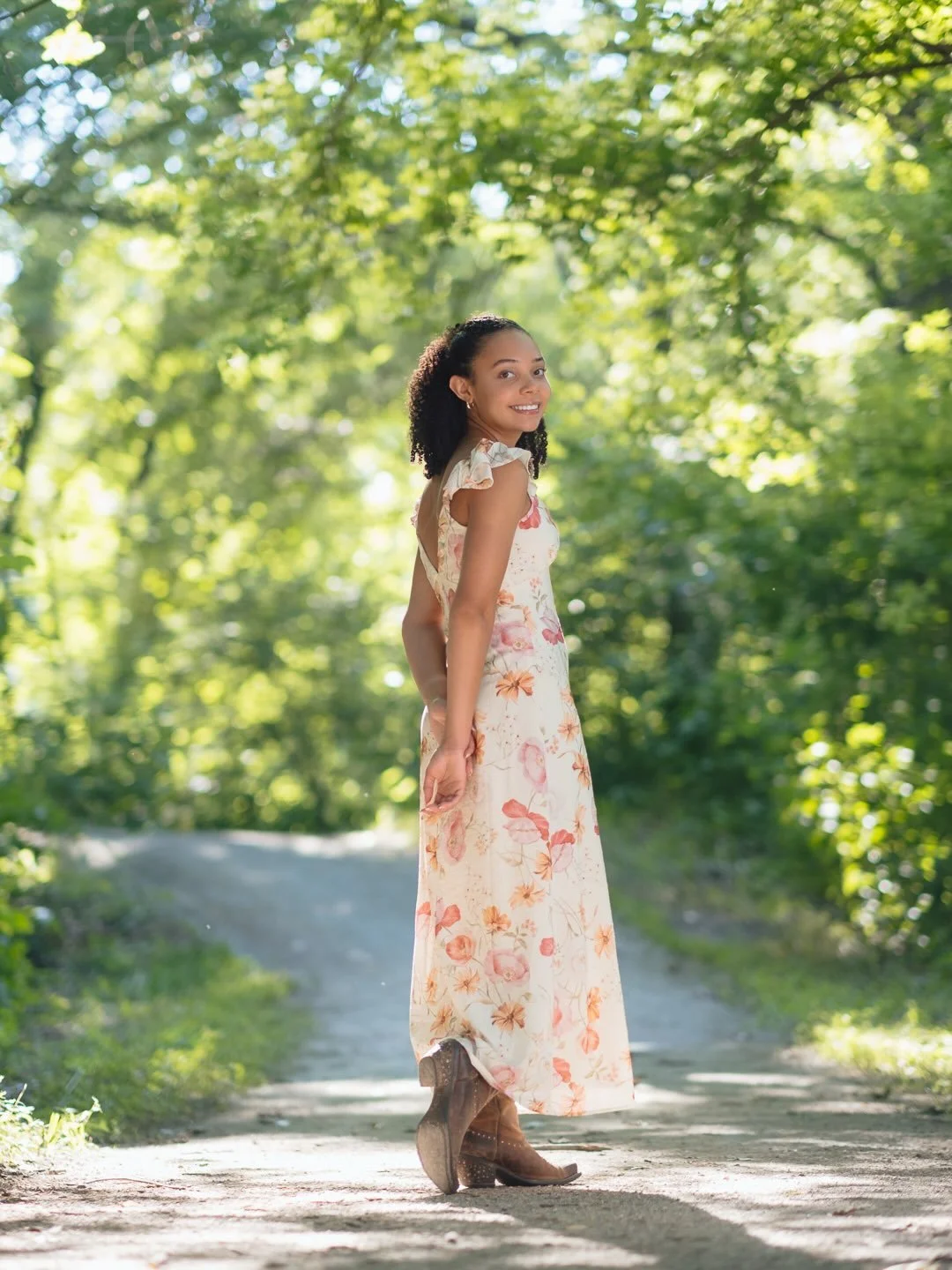 Leah.

We had to weather delay her shoot earlier in the summer, but it was worth it.
A great nature session at Koteewi before it flooded. Flowers, fields, you name it. 
Good luck the rest of your senior year!