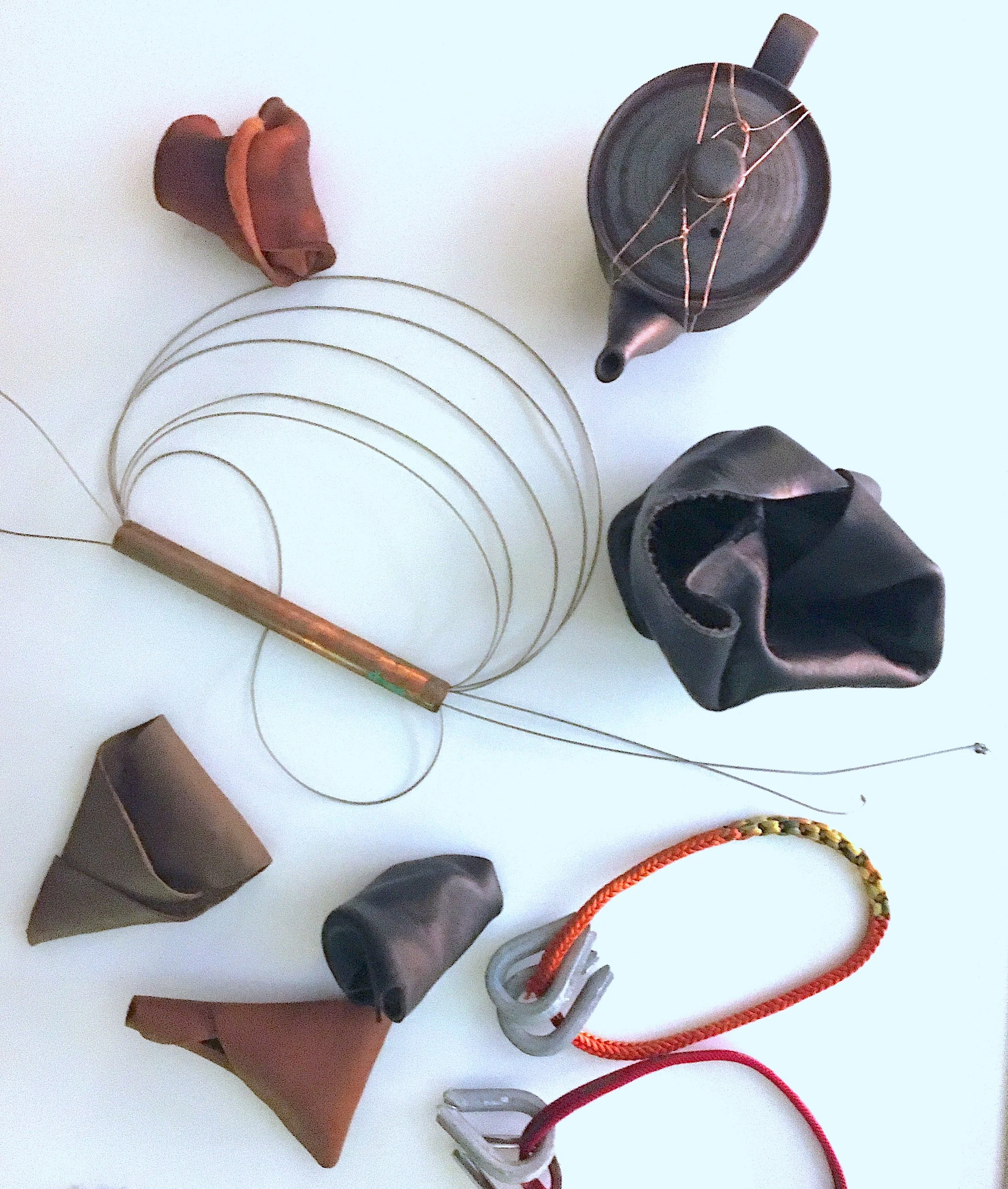  Ad hoc instruments for sound production fashioned from fired leather and found metal and ceramic objects, Tyler Moorehead 2021-2. 