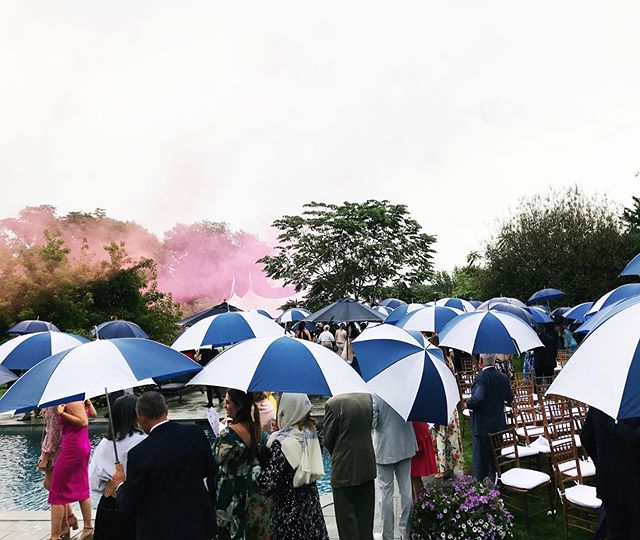 Rain, rain... even if you don&rsquo;t go away, a wedding can still be spectacular, possibly even more romantic (especially with pink smoke bombs to lead the way to dinner)! 💗🔮
.
.
.
.
#ashleyabbottevents #events #eventplanner #eventdesign #eventsty
