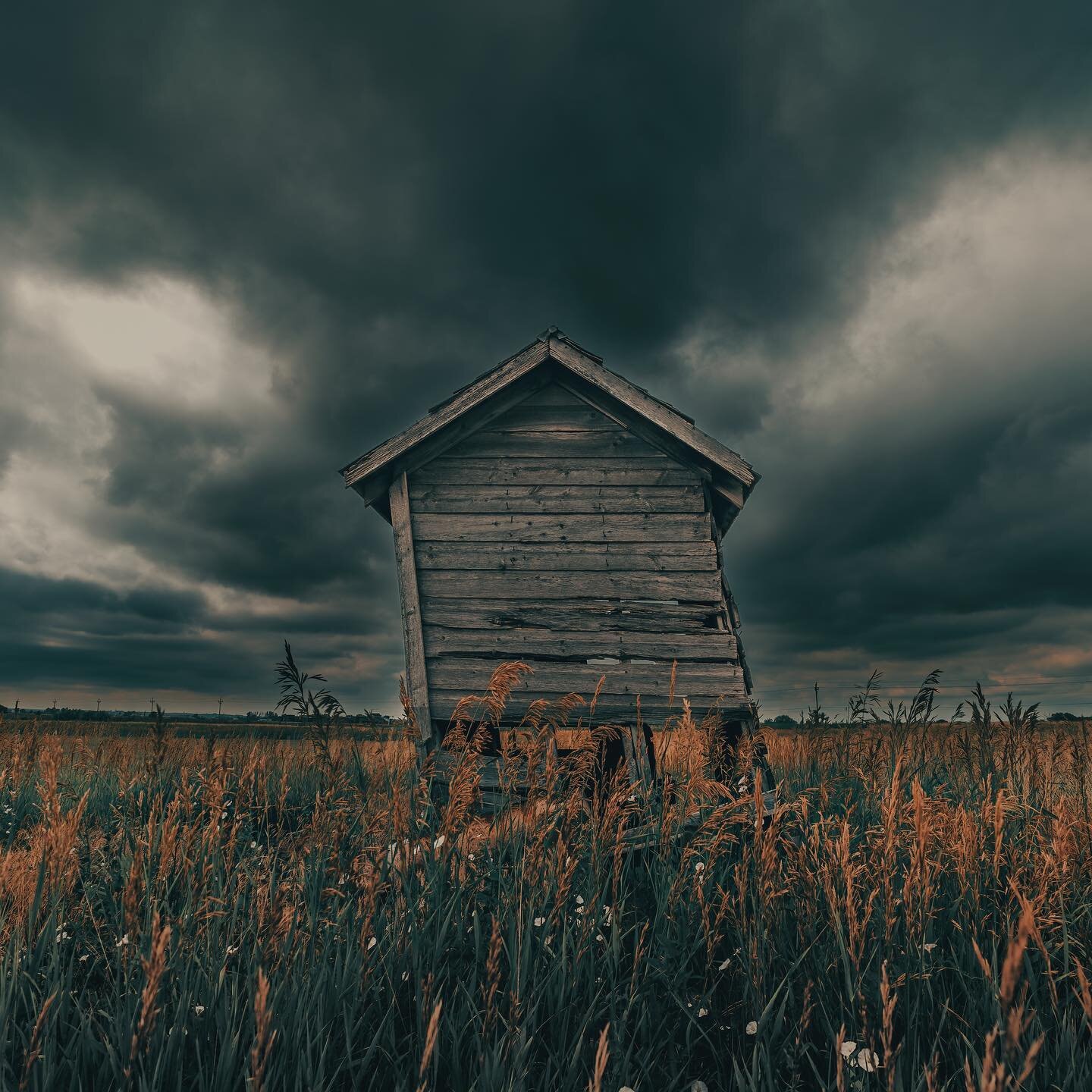 A lonely shack in a Colorado field as a storm approaches&hellip; #CO #colorado #darksky #photography #landscapephotography #scary #mood #mylens