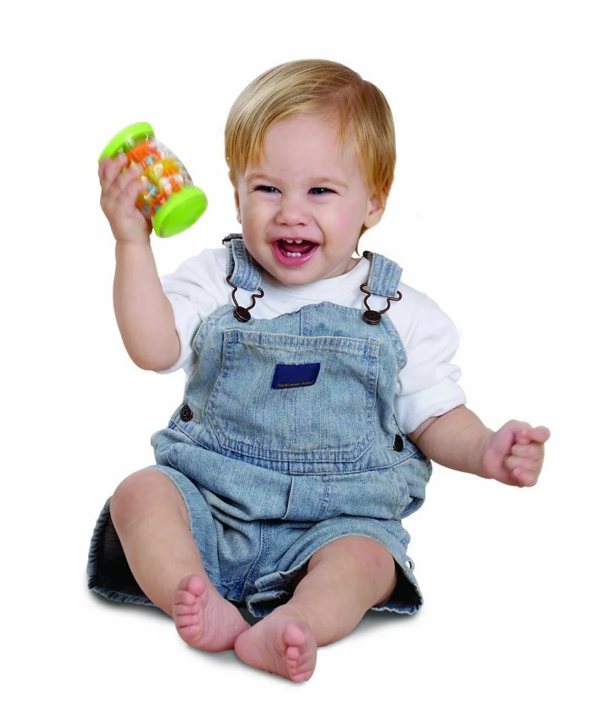 child with rainboshaker.jpg