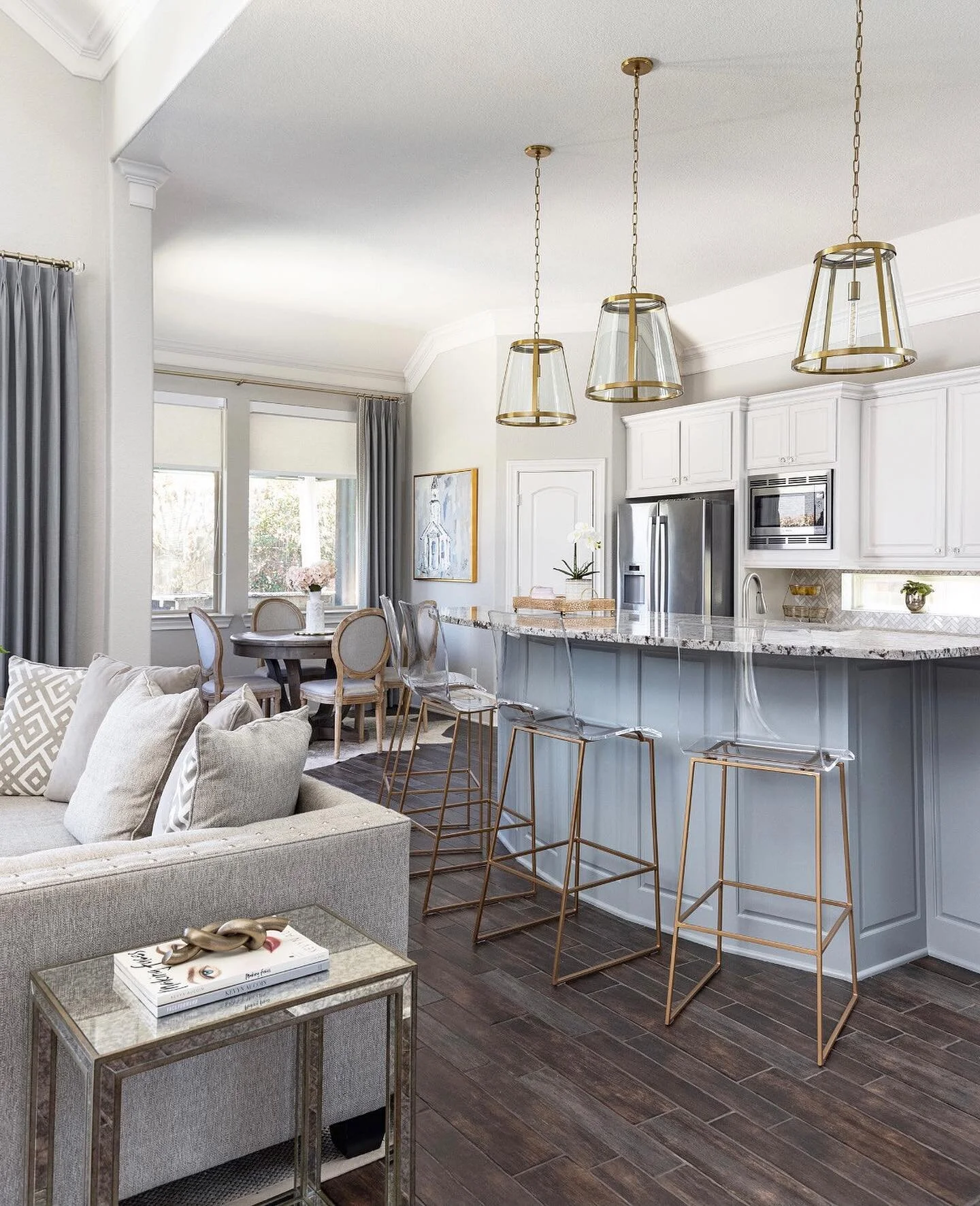 Today feels like a great day for a before and after. The layout of this kitchen didn’t change, but new paint, backsplash, lighting, hardware, and stools transformed the look! 
⠀⠀⠀⠀⠀⠀⠀⠀⠀
We have several kitchens in the works, right now, and some