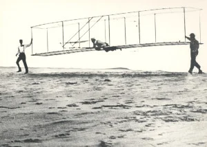 *1902_Wright_Brothers_Historic-Glider_Tests_public-domain-300x214.jpg