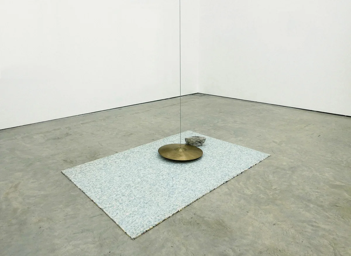 the impossibility of an island , 2016 cymbal, steel wire, concrete, carpet underlay, motor collection irish museum of modern art (IMMA)