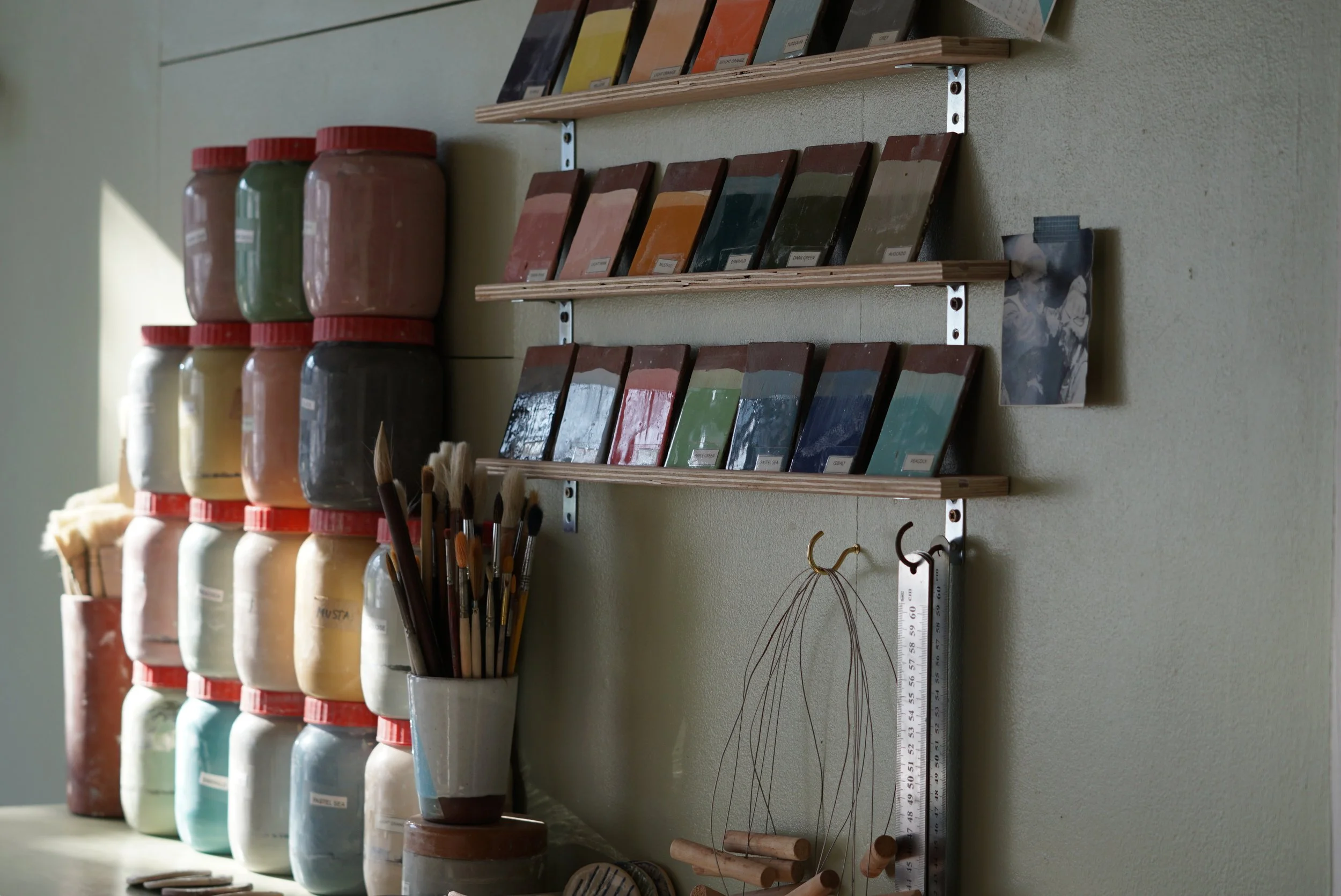 Decorative Clay Slips and Coloured Test Tiles on the Wall