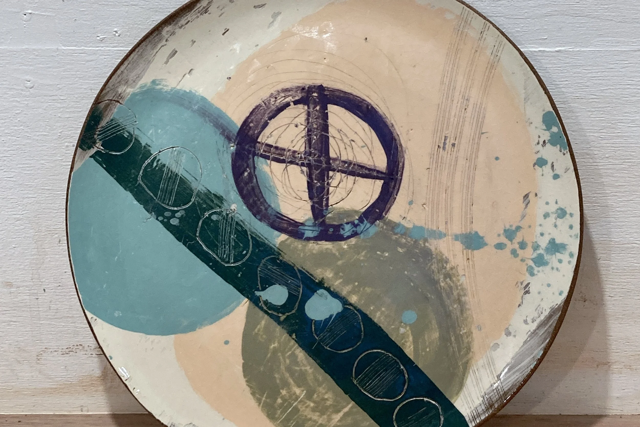 Abstract mono-printed terracotta platter by ceramic workshop beginner participant