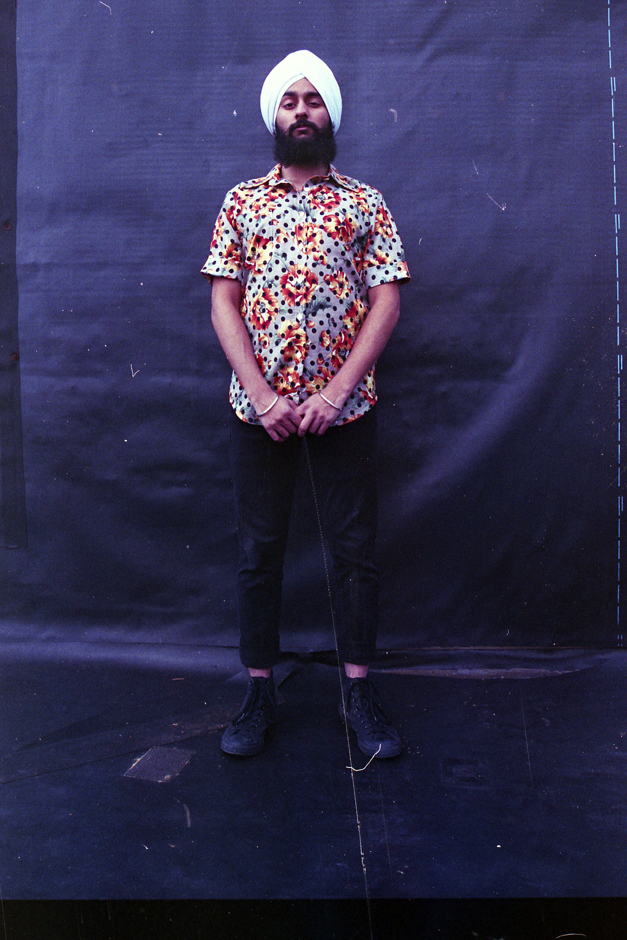 Model wearing the Polka Dot Floral Summer Shirt by Slow Process