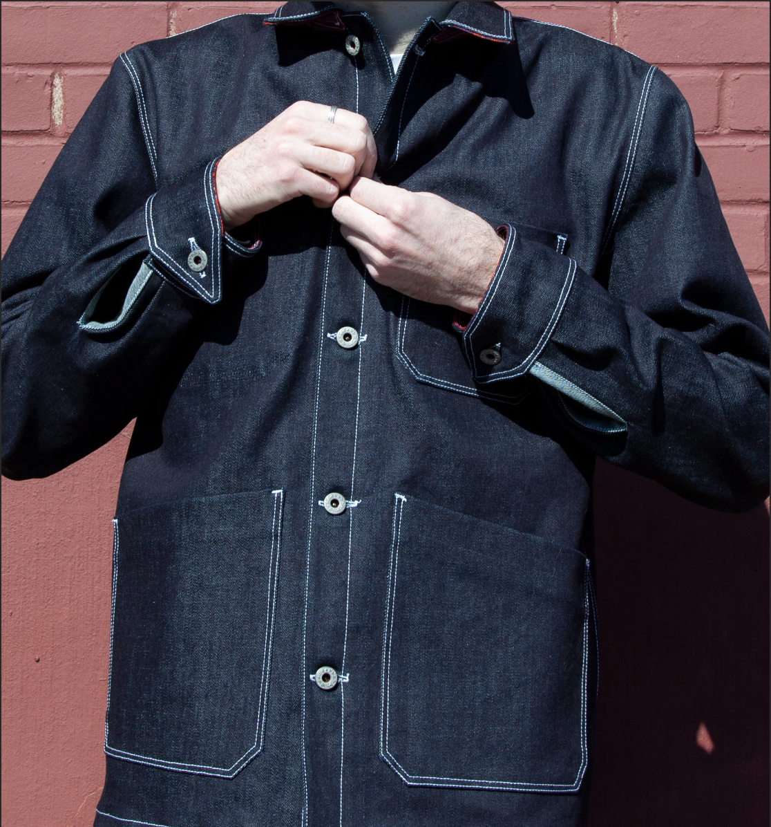chorecoat_buttoning_closeup.png