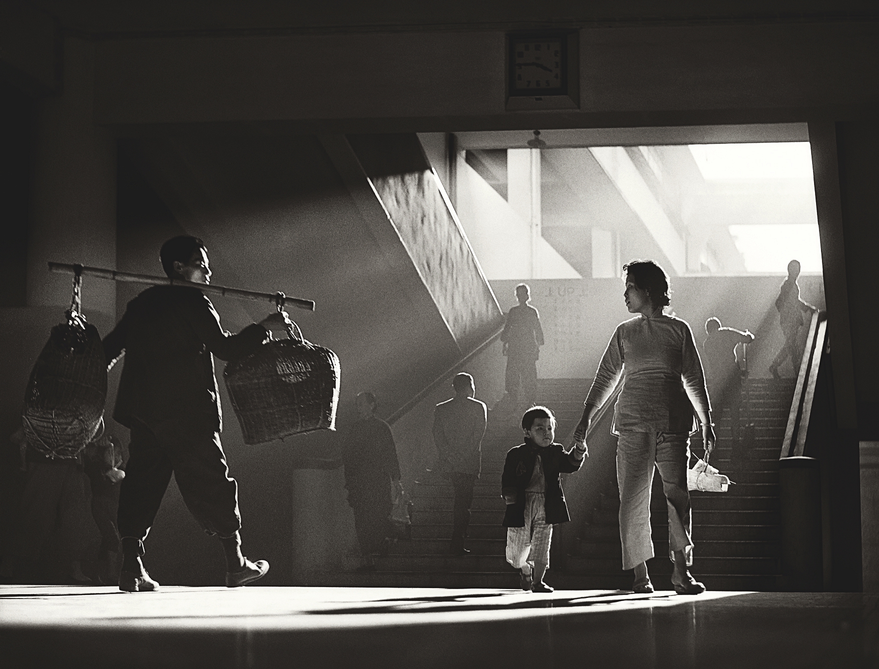Fan Ho 'Quarter to Four(三點九・中環街市)' Hong Kong 1950s and 60s, courtesy of Blue Lotus Gallery